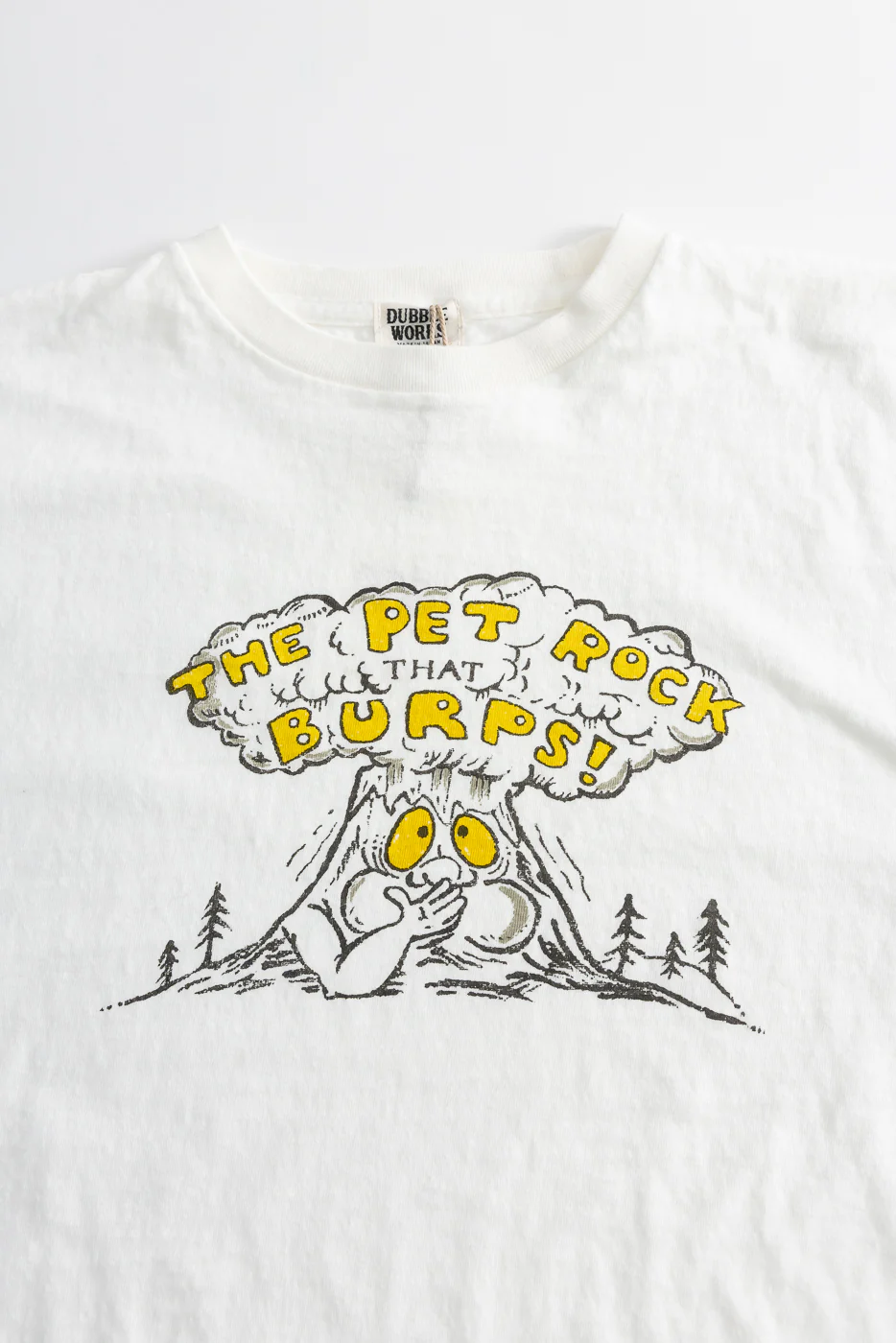 5.4oz - Raffy Tenjiku Printed T-Shirt "The Pet Rock" - Off White - Image 2